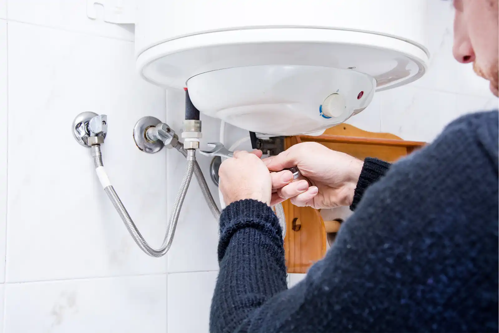 repairing sink sweater